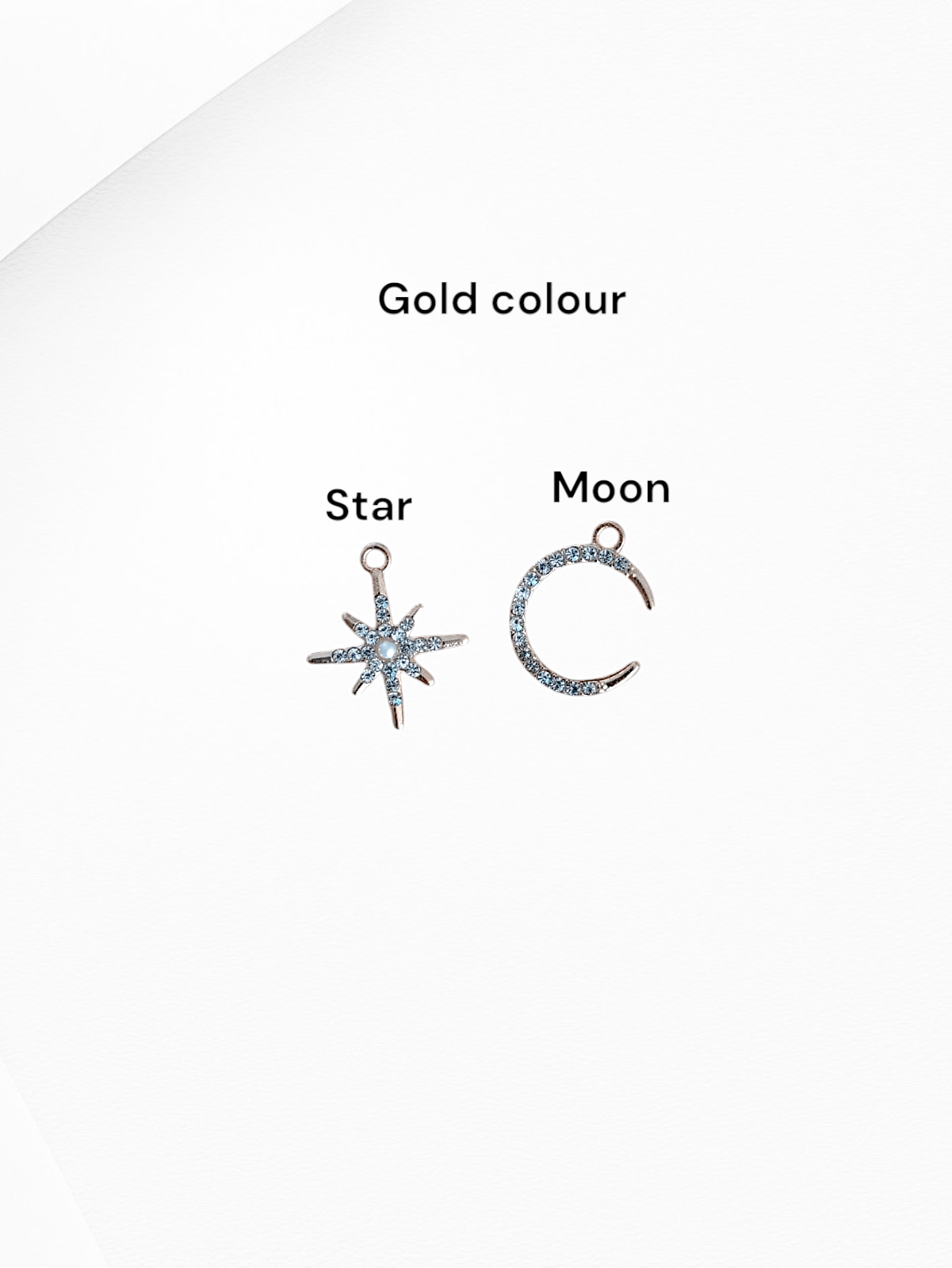 Small golden stone charms